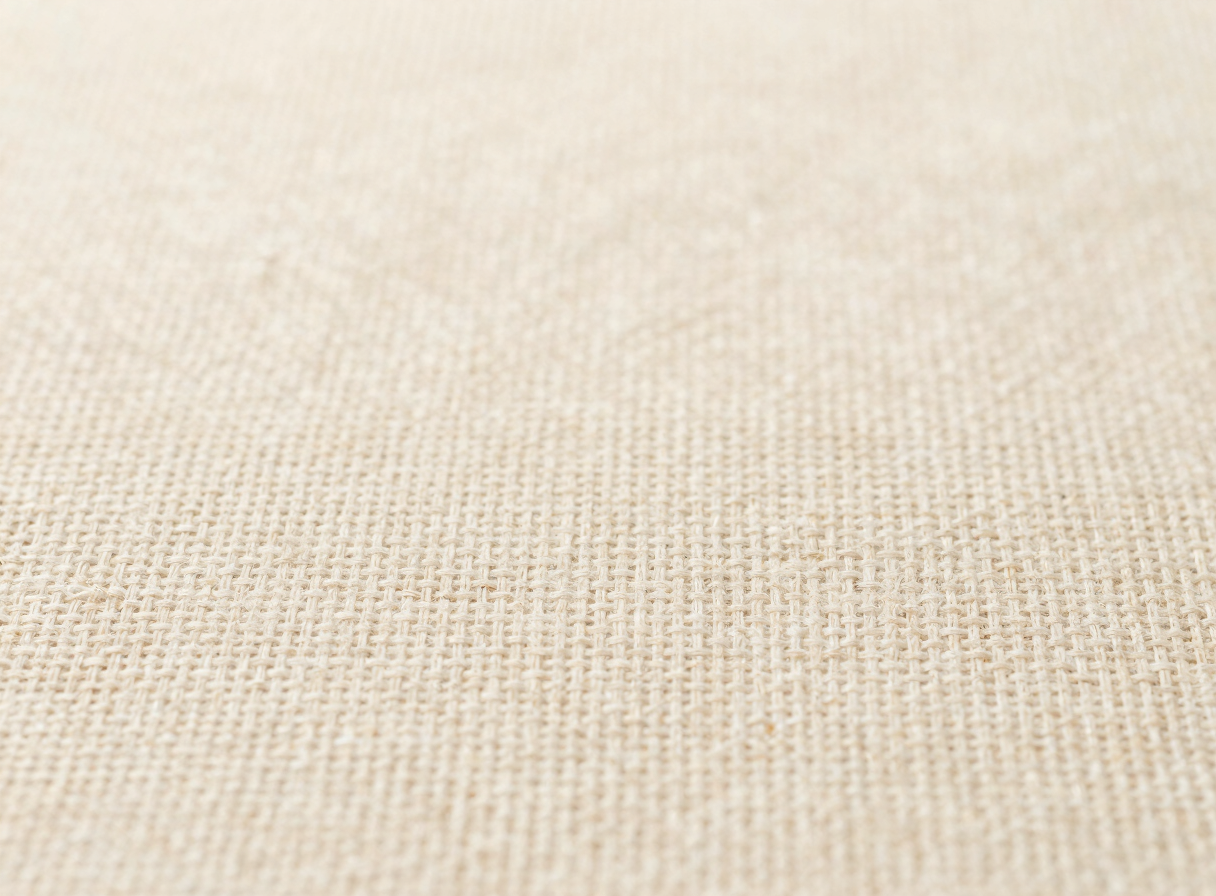 Close-up of natural linen fabric weave showing its texture